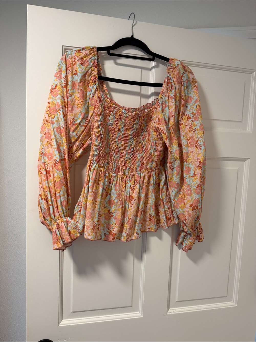 Smocked Floral Peasant Blouse in Peach Multi